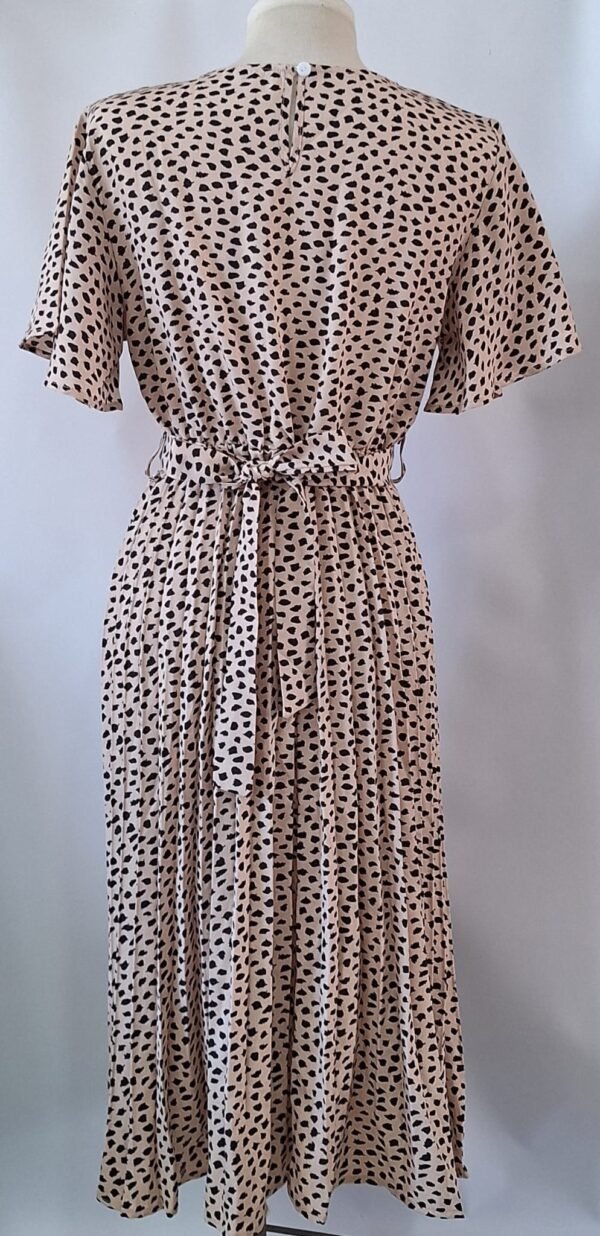 90b414fa-4210-4a3f-9461-c7f45111dfbb Vestido Corte en A, plisado